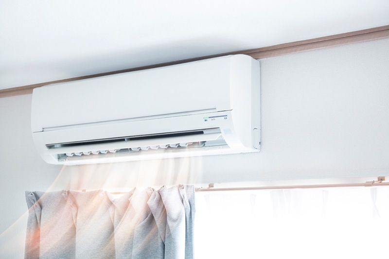Planning to Remodel? Go Ductless! Image shows ductless mini-split in home.